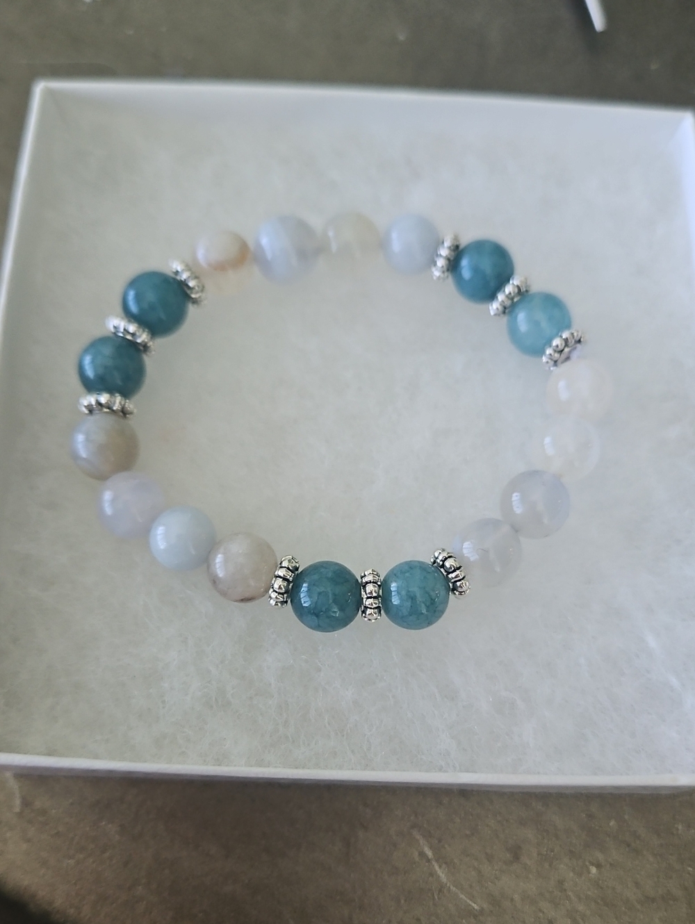 Angelite And Selenite Beaded Stretch Bracelet With Silver Spacers.